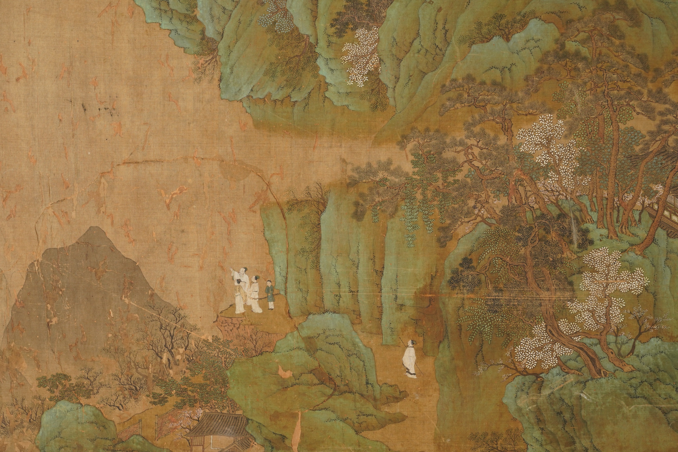 Chinese School , 17th century or earlier, Scholars in a mountainous river landscape scene with pavilions, Ink and colour on silk, incomplete clerical script signature, 54cm x 290cm
